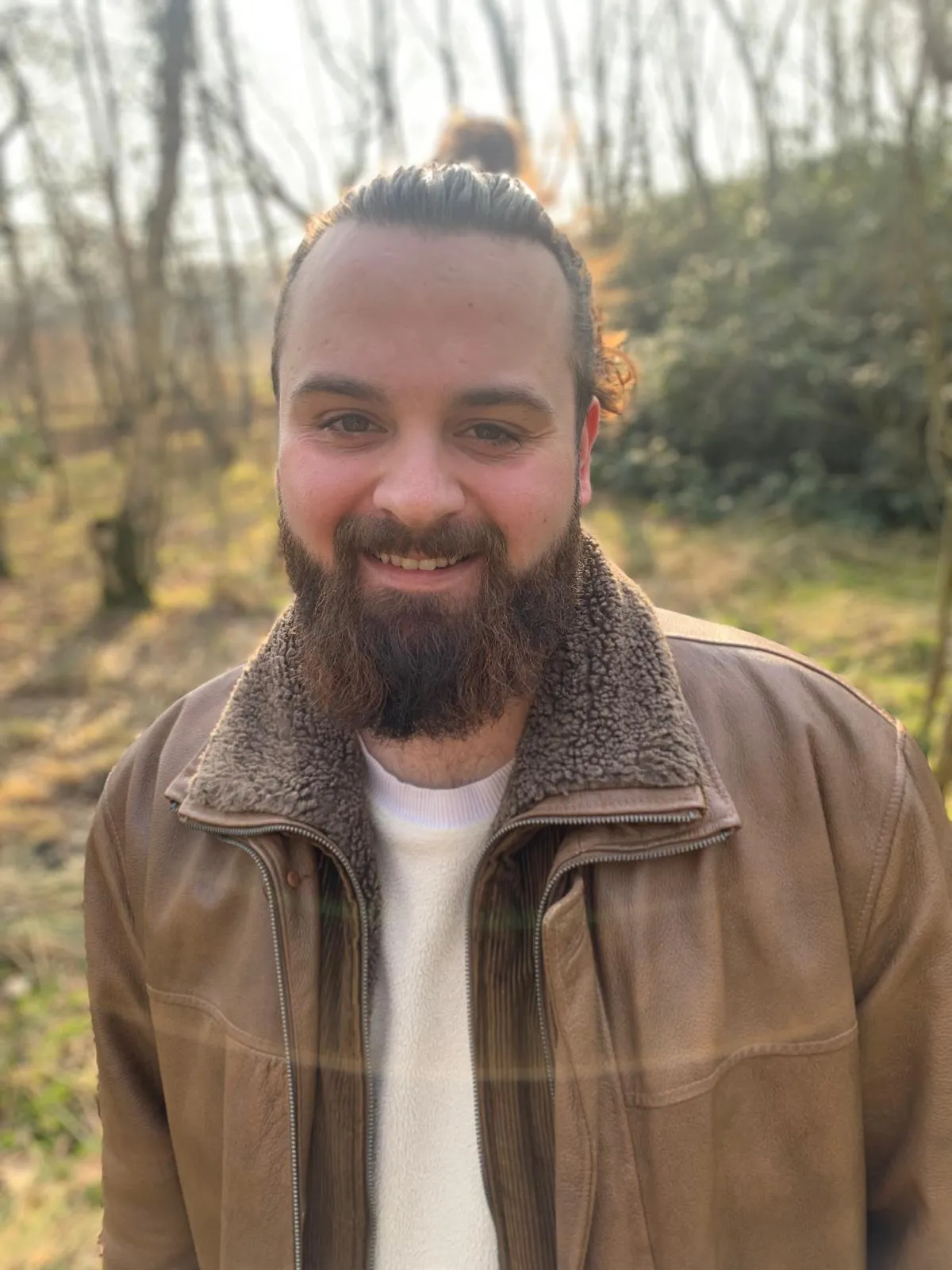 Barney, the coach behind Level Up Life Coaching, outdoors